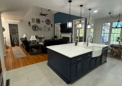 Modern kitchen remodel with blue island and open concept design