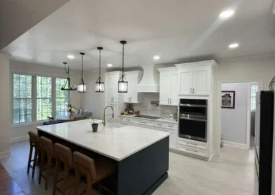 Open concept kitchen remodeling with modern island and dining area