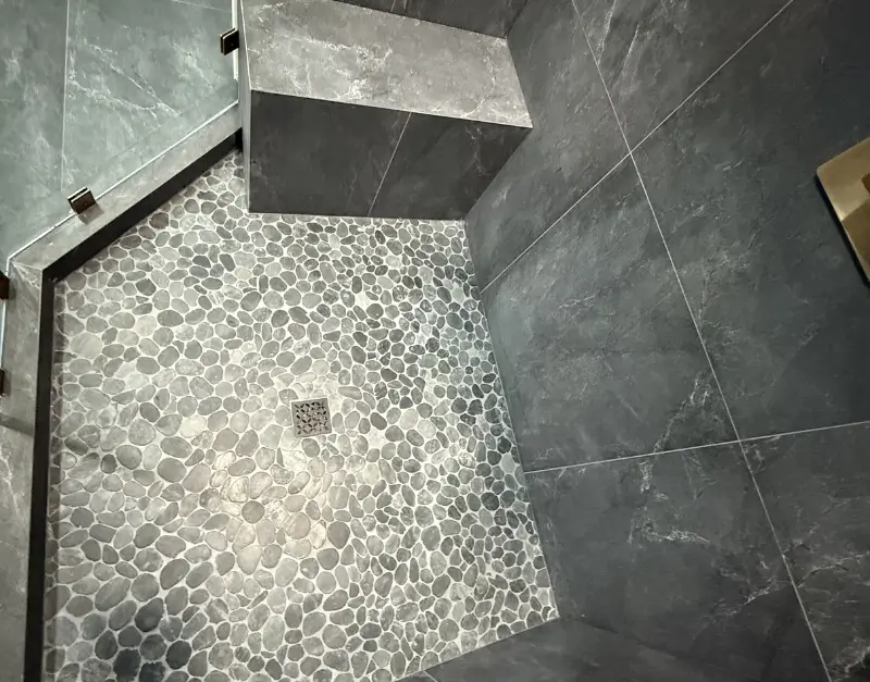 Custom Pebble Tile Shower Floor with Bench